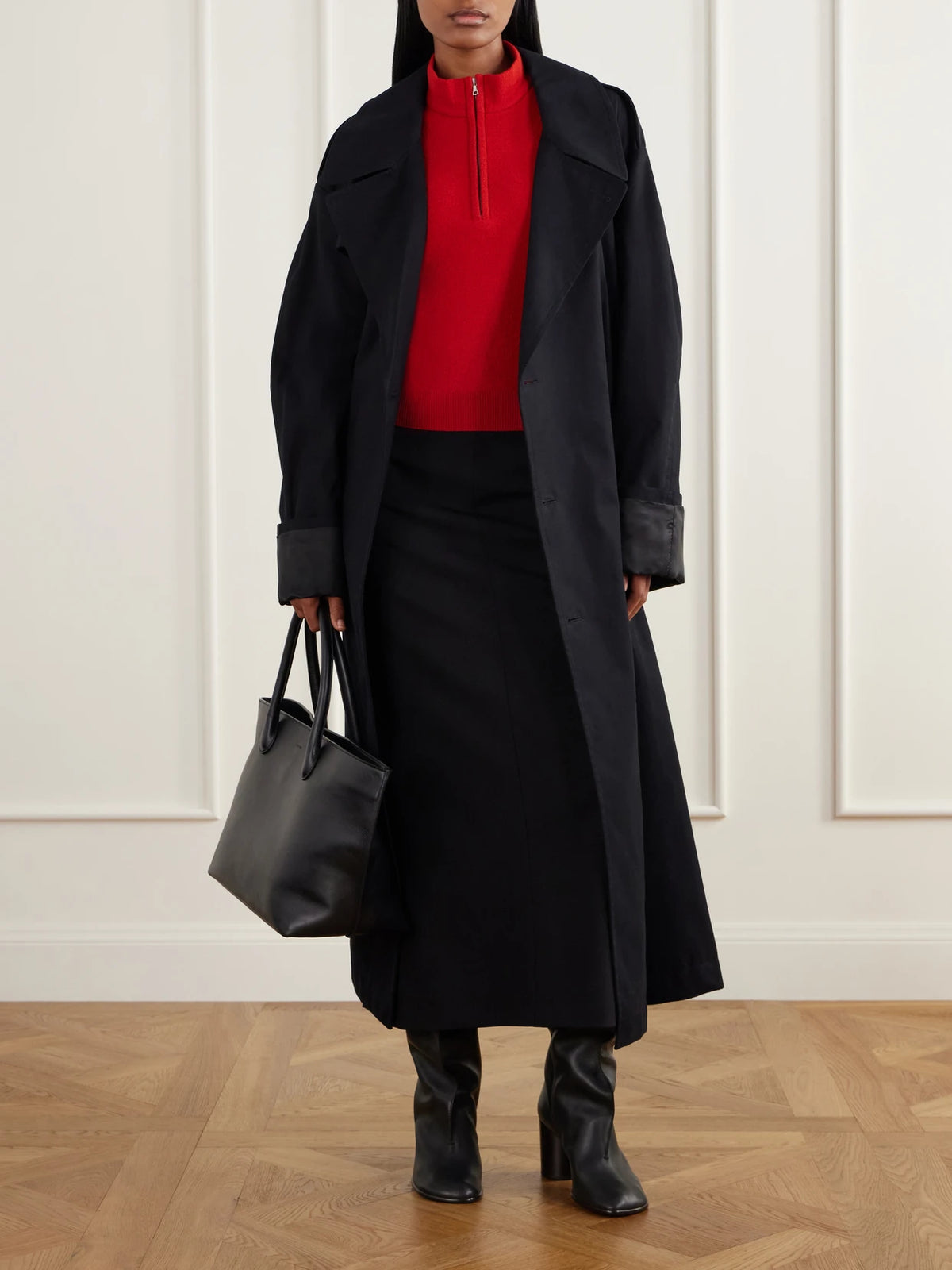 Image of a model wearing Outerwear. Product name - Wool Half-zip Sweater in Red colour by brand - Auralee