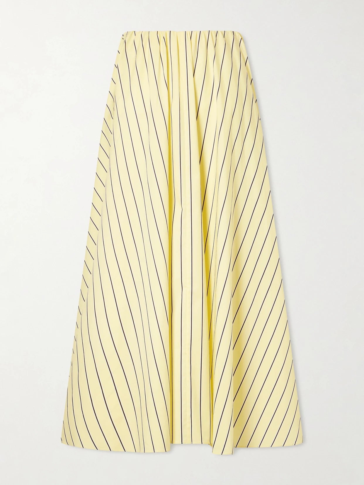 Image of a model wearing Skirts. Product name - Milano Striped Cotton-blend Maxi Skirt in Pastel yellow colour by brand - STAUD
