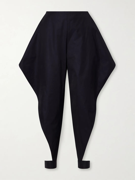Image of a model wearing Pants. Product name - Triangle Cotton-gabardine Wide-leg Pants in Navy colour by brand - Alaïa