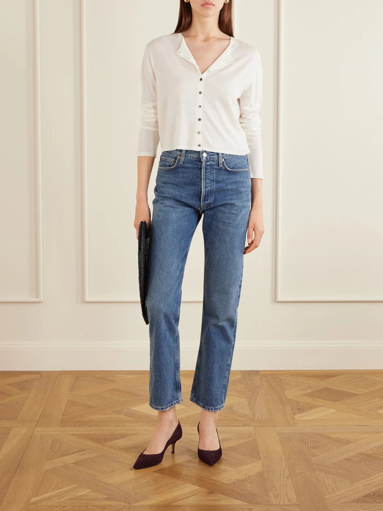 Image of a model wearing Outerwear. Product name - James Merino Wool Cardigan in White colour by brand - LESET