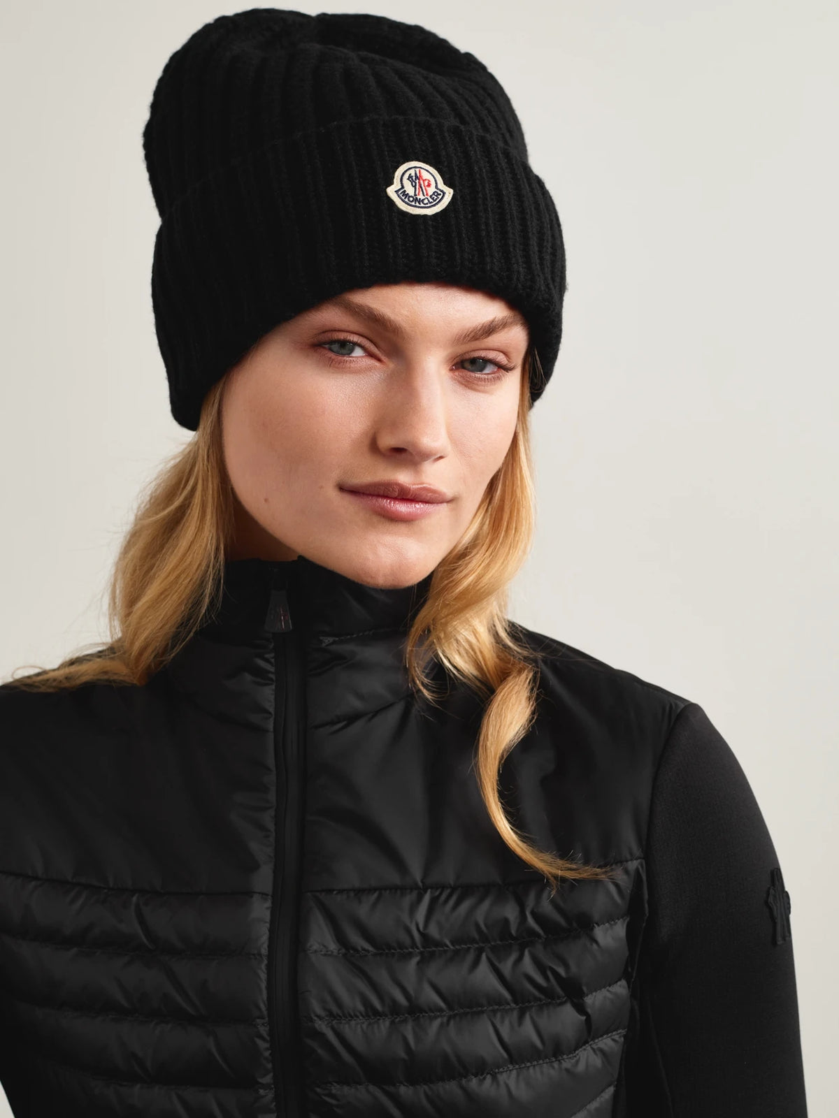 Image of Hats. Product name - Appliquéd Ribbed Wool And Cashmere-blend Beanie in Black colour by brand - Moncler