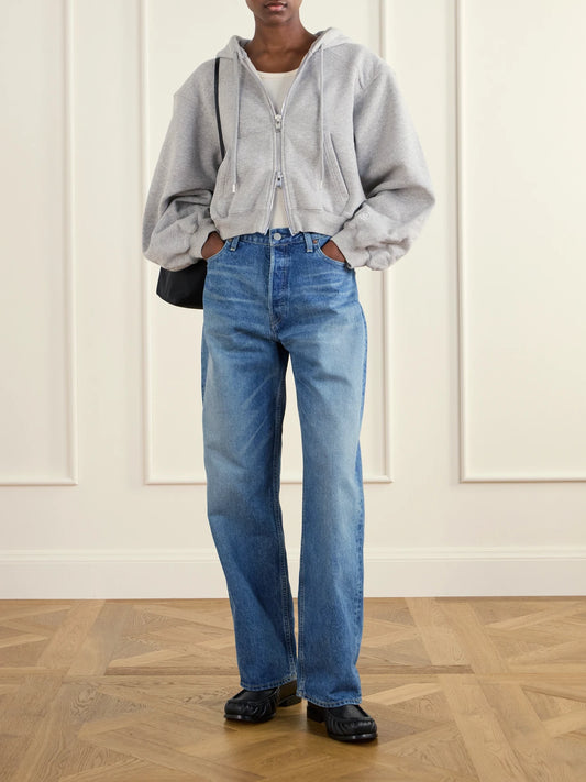 Image of a model wearing Tops. Product name - The Augustine Organic Cotton-jersey Hoodie in Gray colour by brand - RÙADH