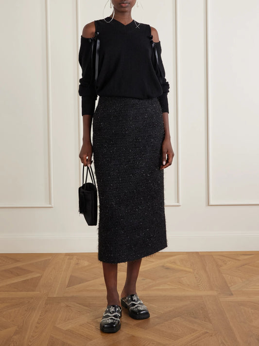 Image of a model wearing Skirts. Product name - Shearling-trimmed Metallic-tweed Midi Skirt in Black colour by brand - Simone Rocha