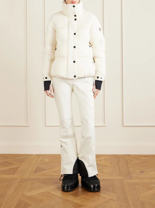 Image of a model wearing Pants. Product name - Flared Ski Pants in White colour by brand - Moncler Grenoble