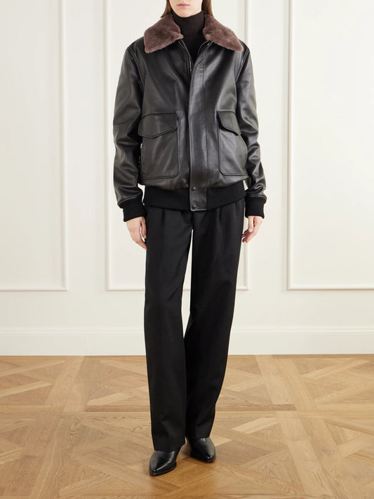 Image of Coats & Jackets. Product name - Grant Shearling-trimmed Leather Bomber Jacket in Black colour by brand - Gabriela Hearst