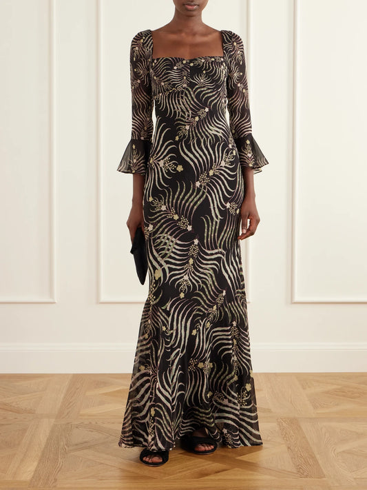 Image of Dresses. Product name - Willa Printed Silk-chiffon Gown in Black colour by brand - Saloni