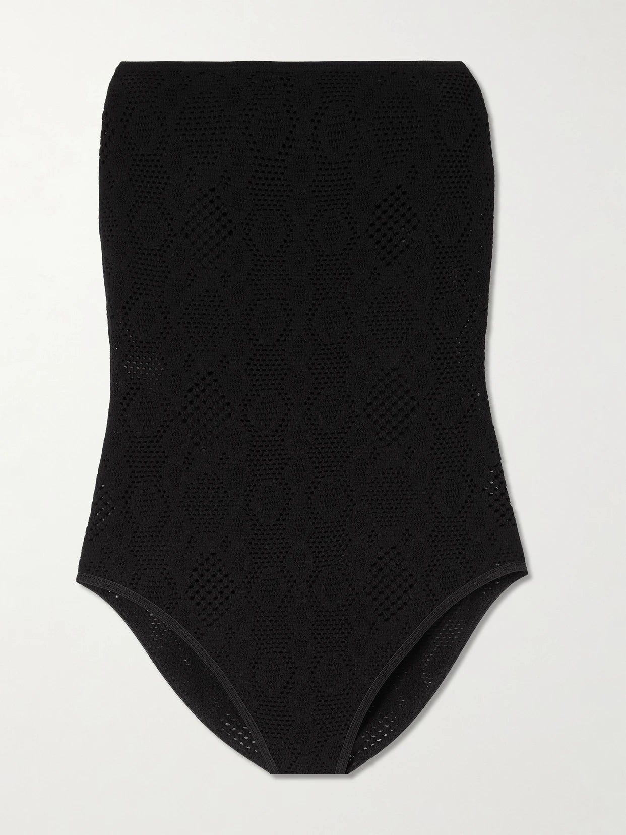 Image of a model wearing Tops. Product name - Strapless Pointelle-knit Bodysuit in Black colour by brand - Alaïa