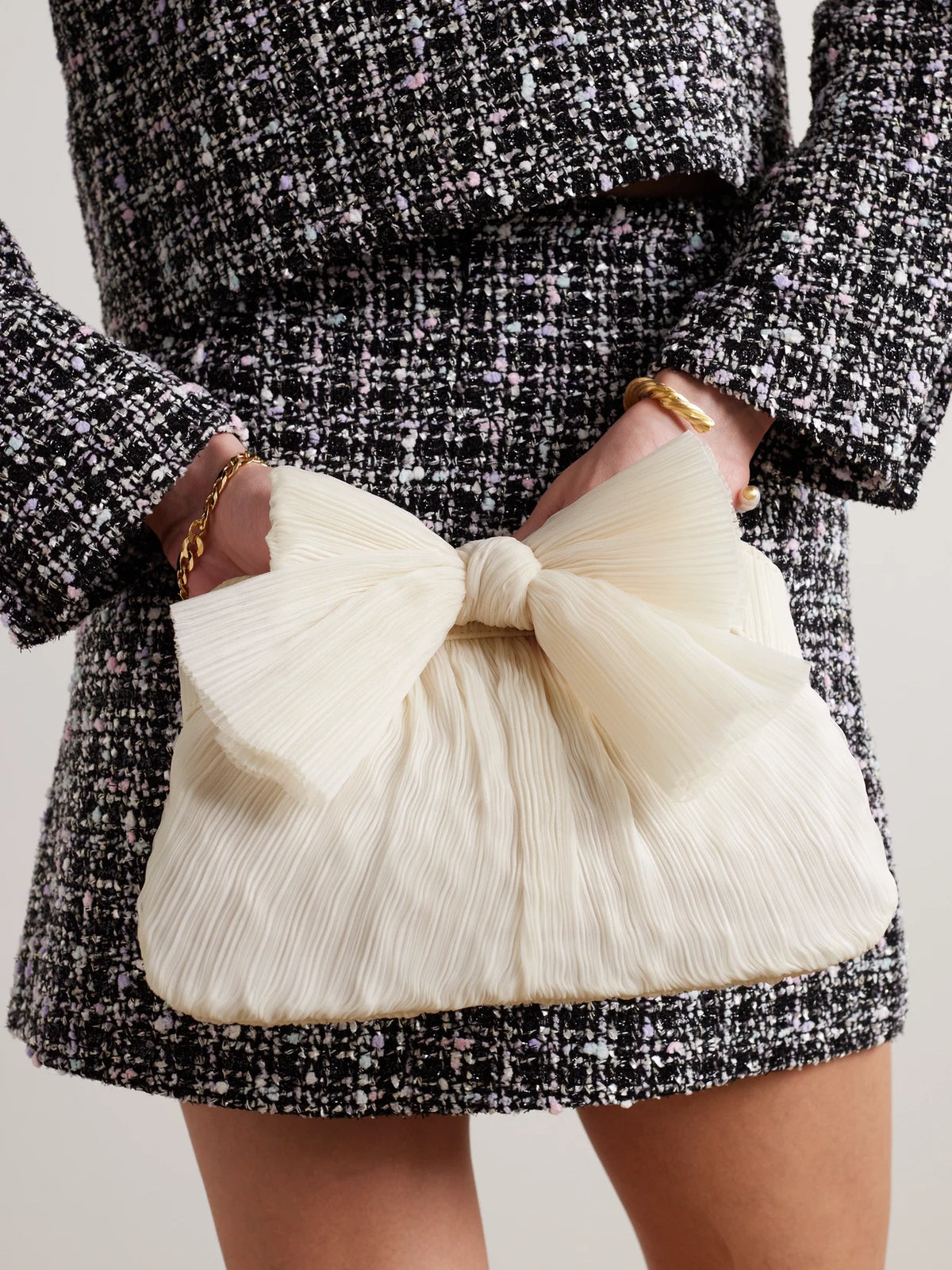 Image of Bags. Product name - Rayne Bow-embellished Plissé-organza Clutch in Off-white colour by brand - Loeffler Randall
