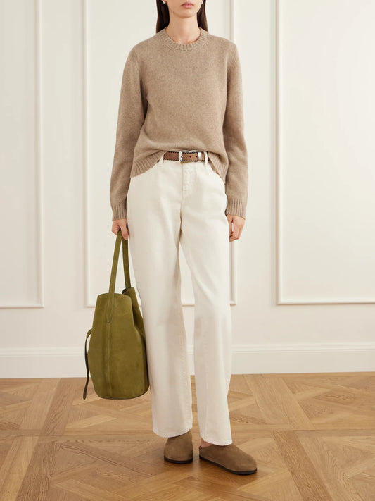 Image of a model wearing Outerwear. Product name - Elena Cashmere Sweater in Beige colour by brand - The Elder Statesman