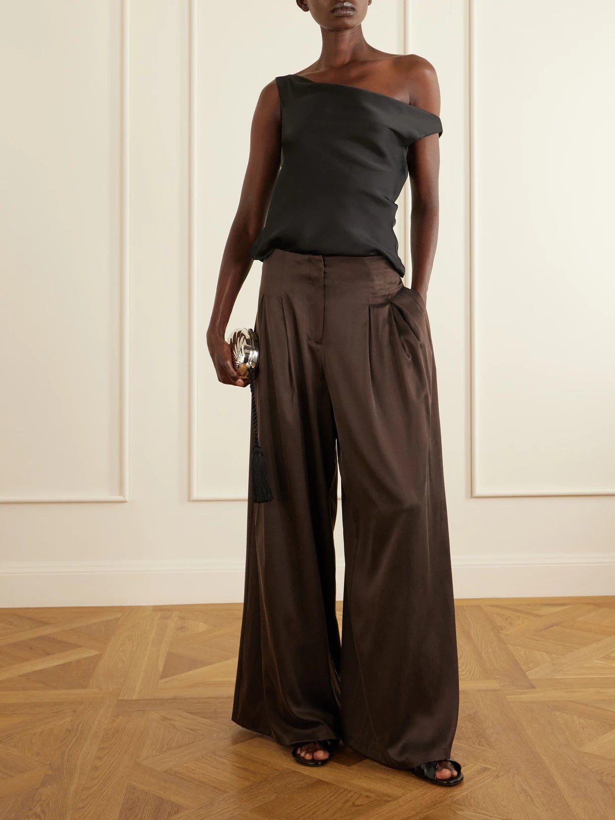 Image of a model wearing Pants. Product name - Drew Silk-blend Charmeuse Wide-leg Pants in Brown colour by brand - TWP