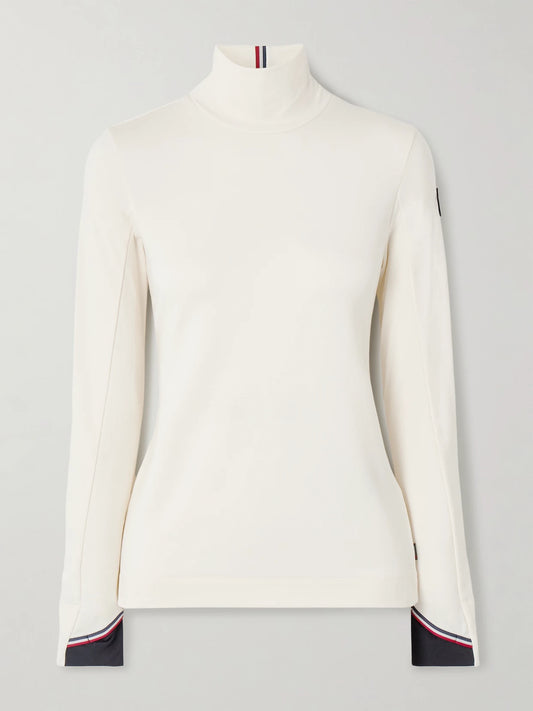 Image of a model wearing Tops. Product name - Polartec Stretch-knit Turtleneck Base Layer in Cream colour by brand - Moncler Grenoble