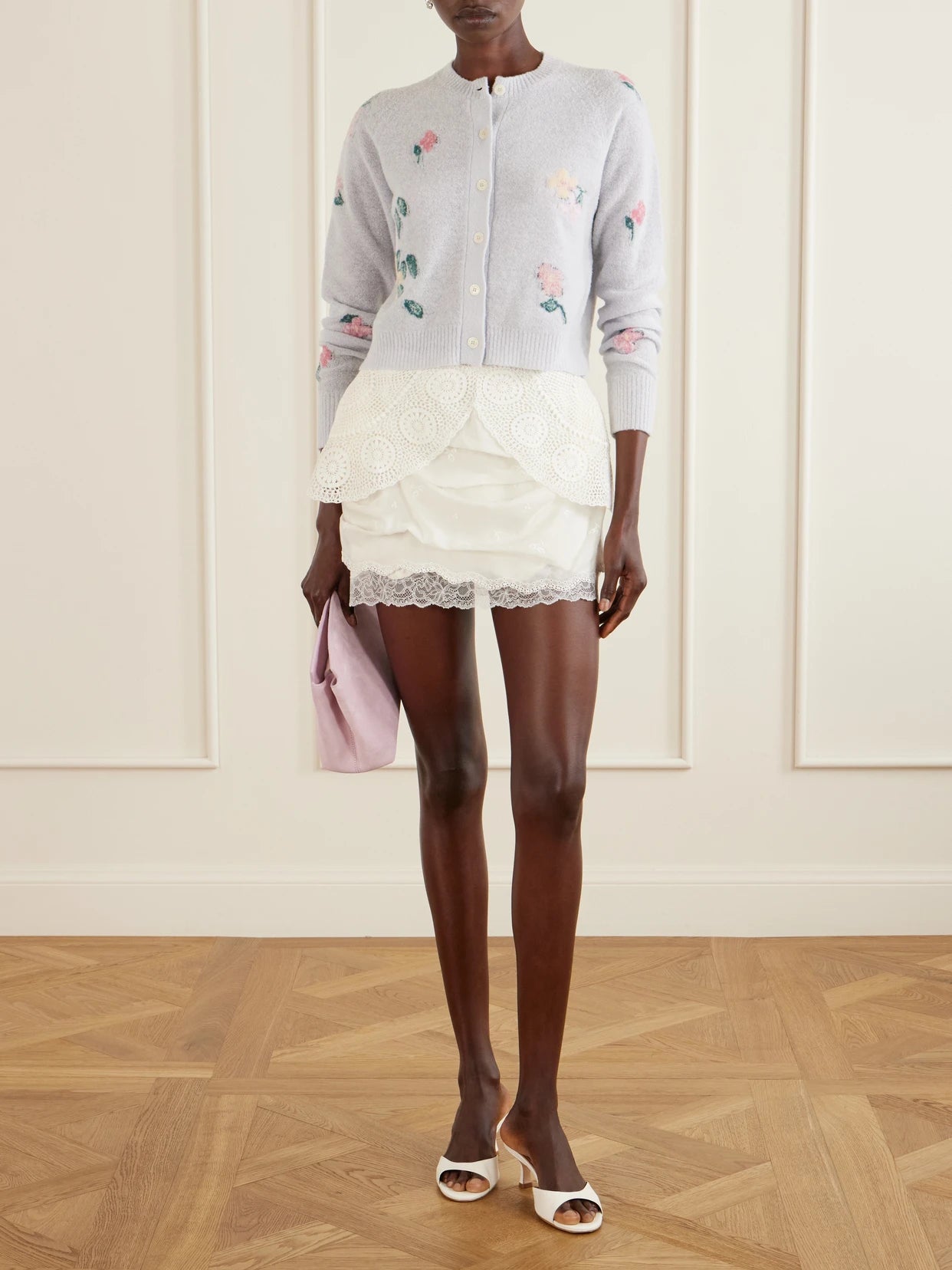 Image of a model wearing Outerwear. Product name - Clemence Wool-blend Floral-patterned Cardigan in Blue colour by brand - BERNADETTE