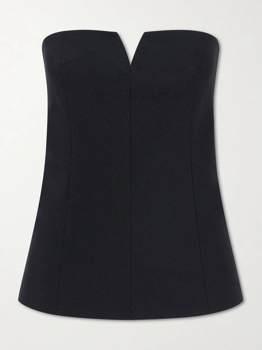 Image of a model wearing Tops. Product name - Strapless Pinstriped Woven Top in Black colour by brand - ST. AGNI