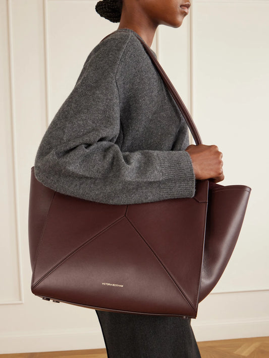 Image of Bags. Product name - The Victoria Leather Tote in Burgundy colour by brand - Victoria Beckham