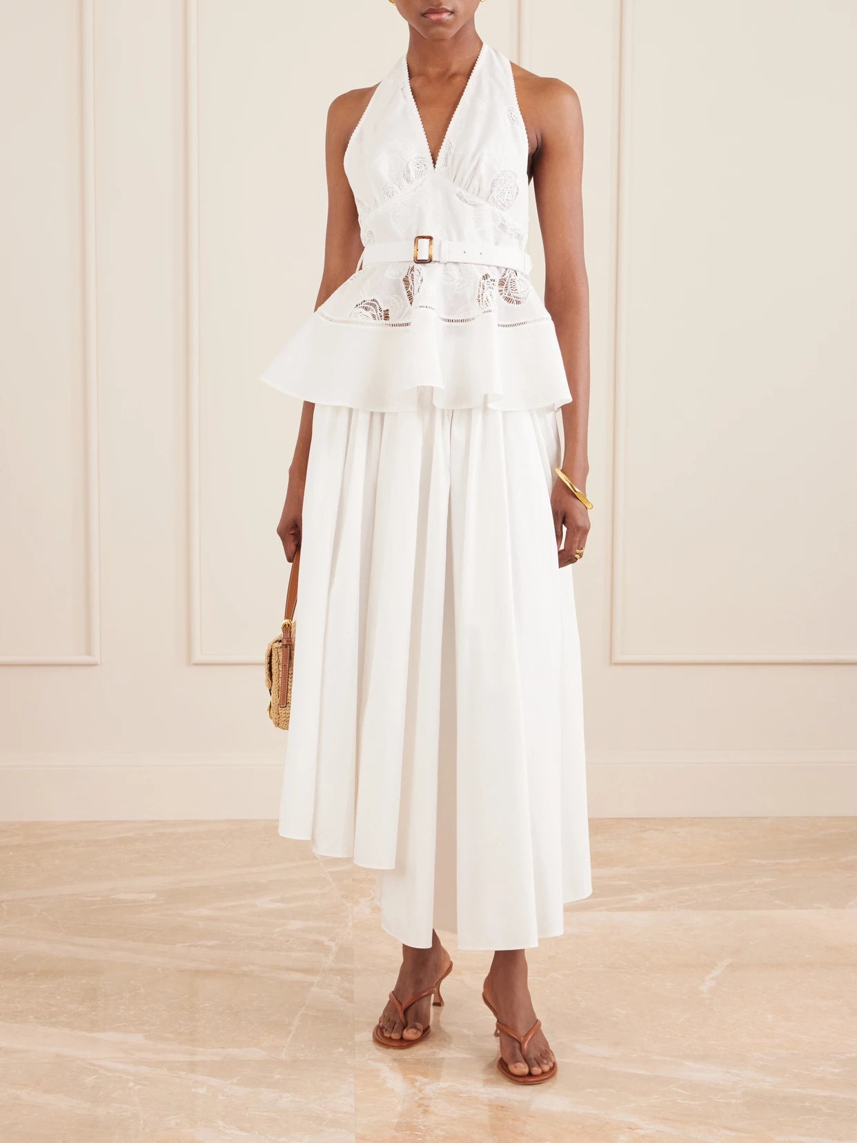 Image of a model wearing Tops. Product name - Belted Embroidered Linen And Cotton-blend Peplum Top in White colour by brand - Self-Portrait