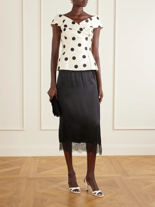 Image of a model wearing Tops. Product name - Bacio Off-the-shoulder Polka-dot Satin-twill Top in Beige colour by brand - Rebecca Vallance