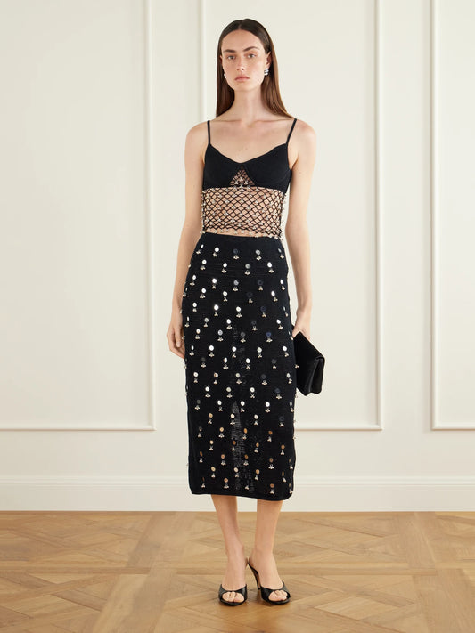 Image of a model wearing Tops. Product name - Catherine Embellished Cotton Crochet-knit Top in Black colour by brand - Yoshita 1967