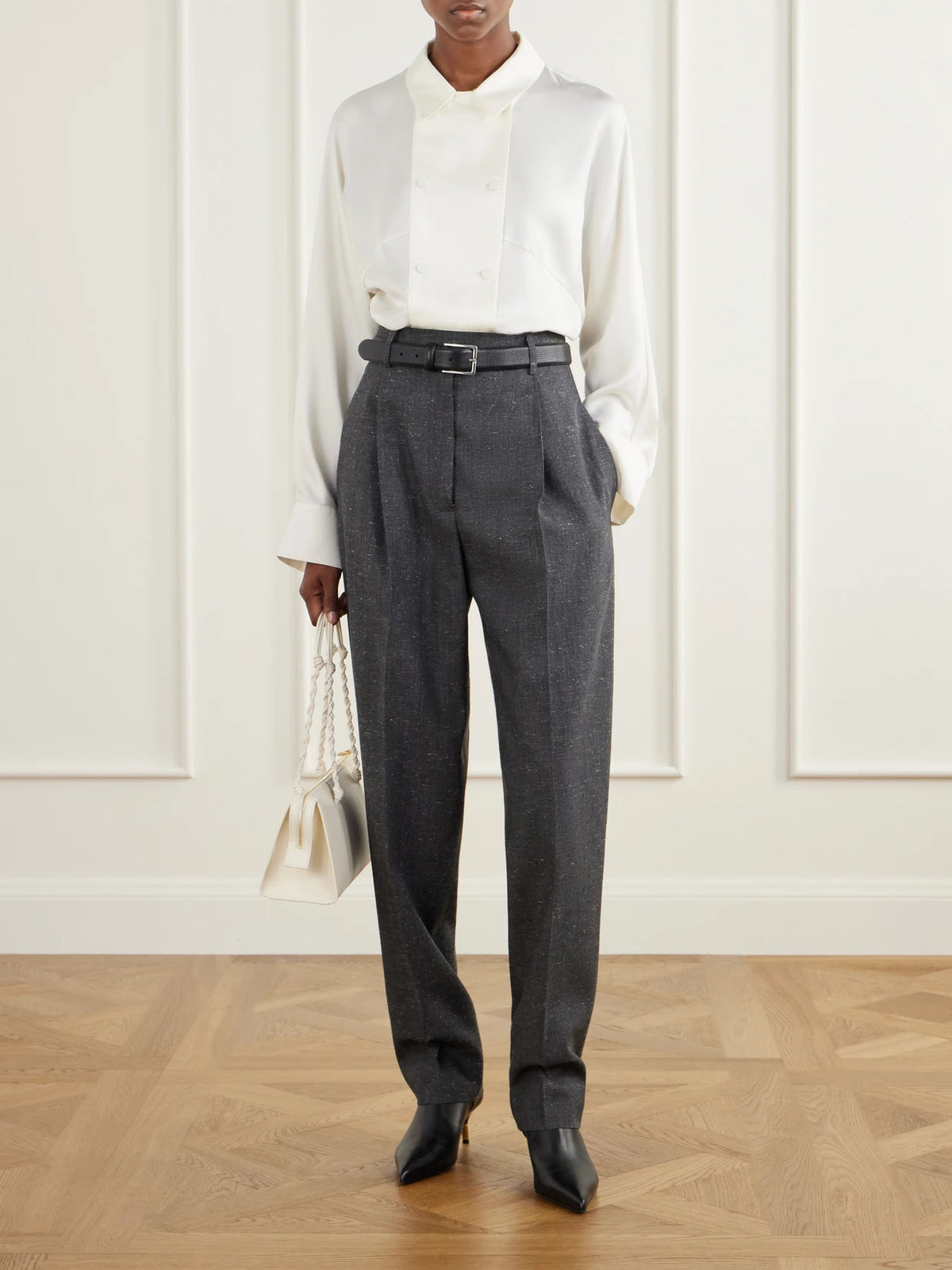 Image of a model wearing Tops. Product name - Double-breasted Silk-satin Blouse in Cream colour by brand - RÓHE