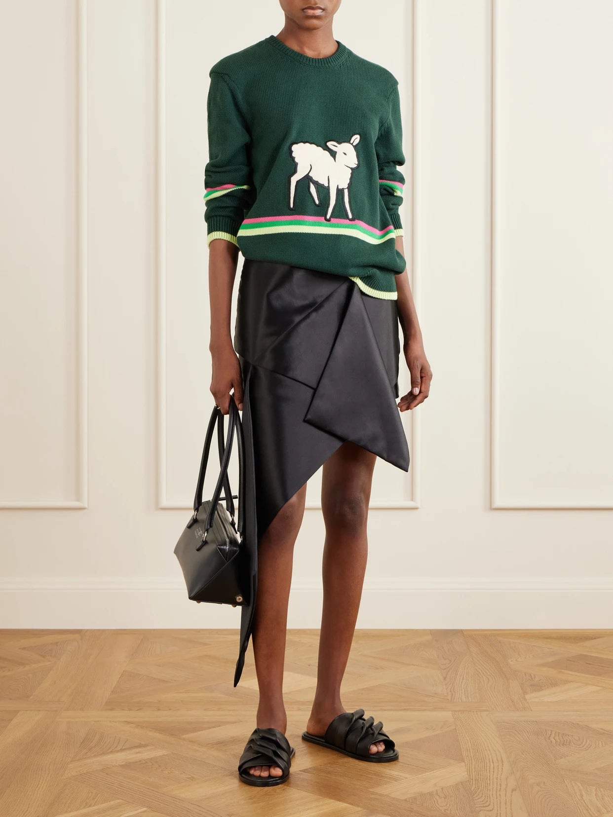 Image of a model wearing Outerwear. Product name - Sheep Embroidered Striped Cotton Sweater in Forest green colour by brand - JW Anderson