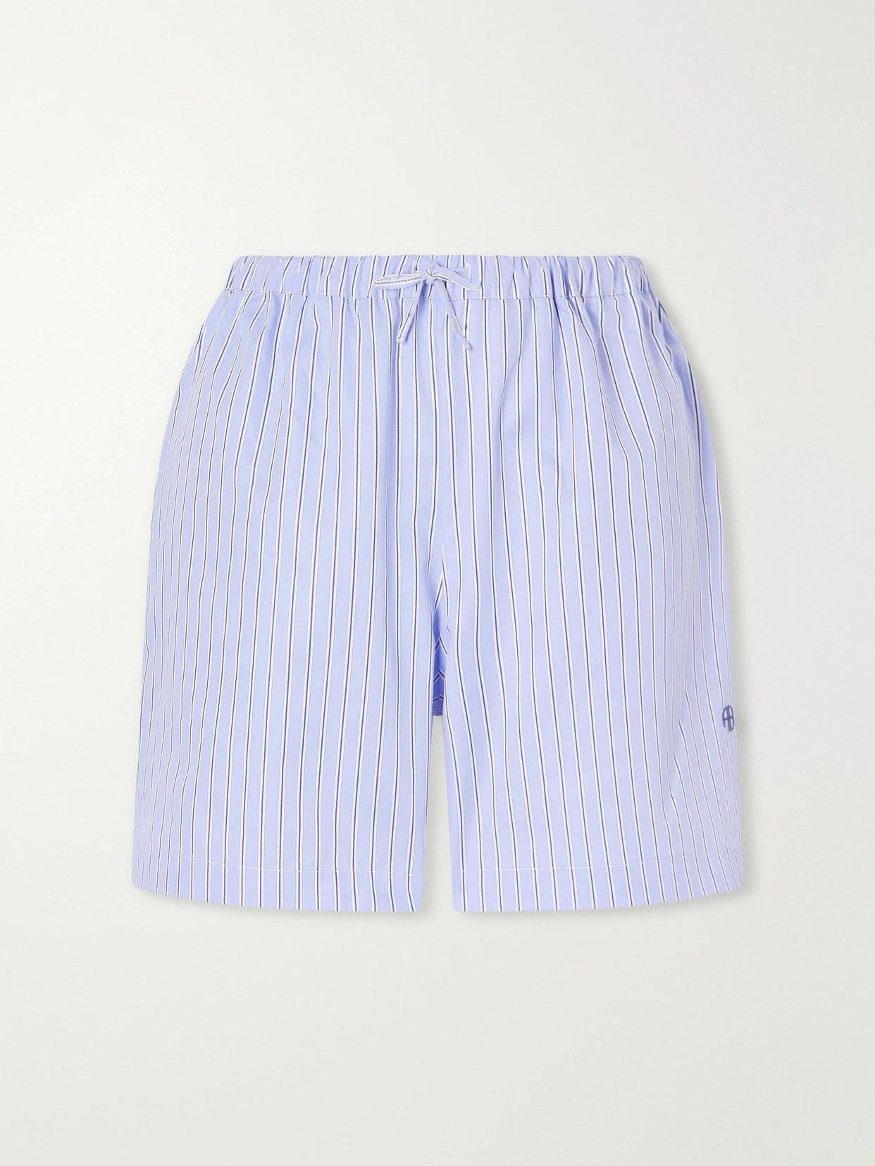 Image of a model wearing Shorts. Product name - Ramy Striped Cotton Shorts in Light blue colour by brand - Anine Bing