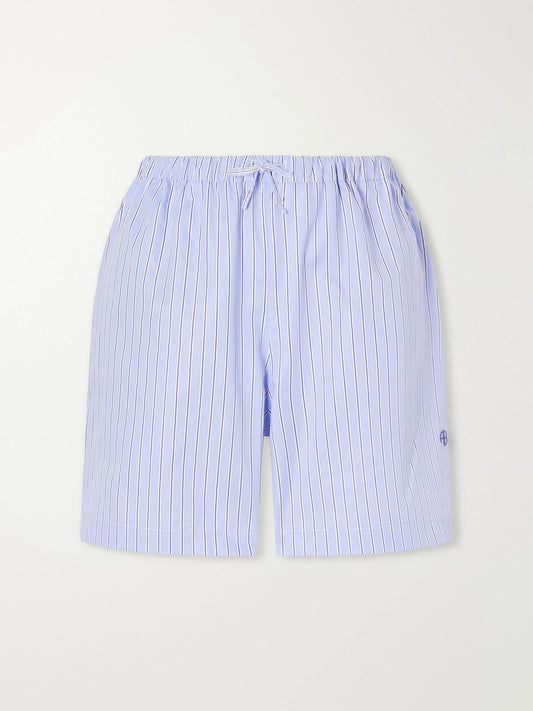 Image of a model wearing Shorts. Product name - Ramy Striped Cotton Shorts in Light blue colour by brand - Anine Bing