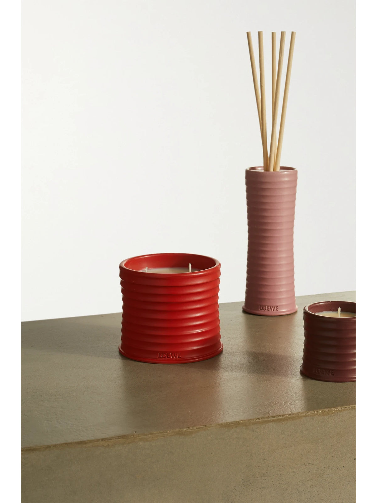 Image of Perfumes & Colognes. Product name - Tomato Leaves Medium Scented Candle, 610g in Red colour by brand - LOEWE PERFUMES