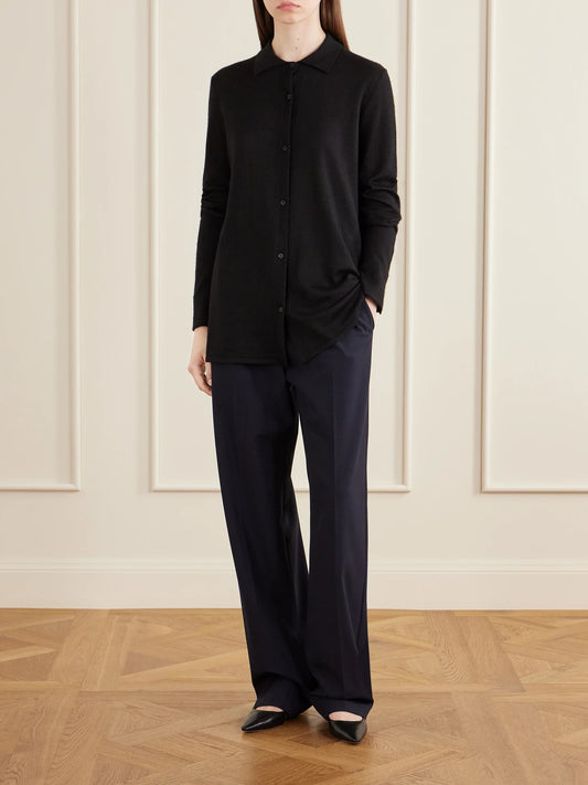 Image of a model wearing Pants. Product name - Mune Merino Wool-poplin Straight-leg Pants in Navy colour by brand - The Row