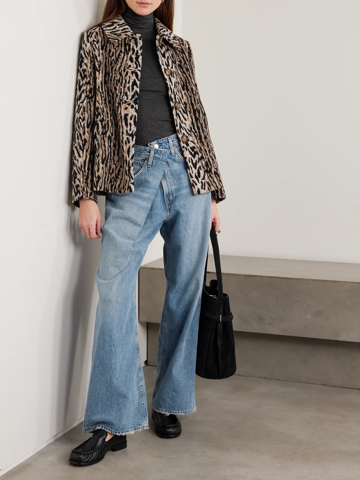 Image of a model wearing Tops. Product name - Pascale Stretch-jersey Turtleneck Top in Dark gray colour by brand - AGOLDE
