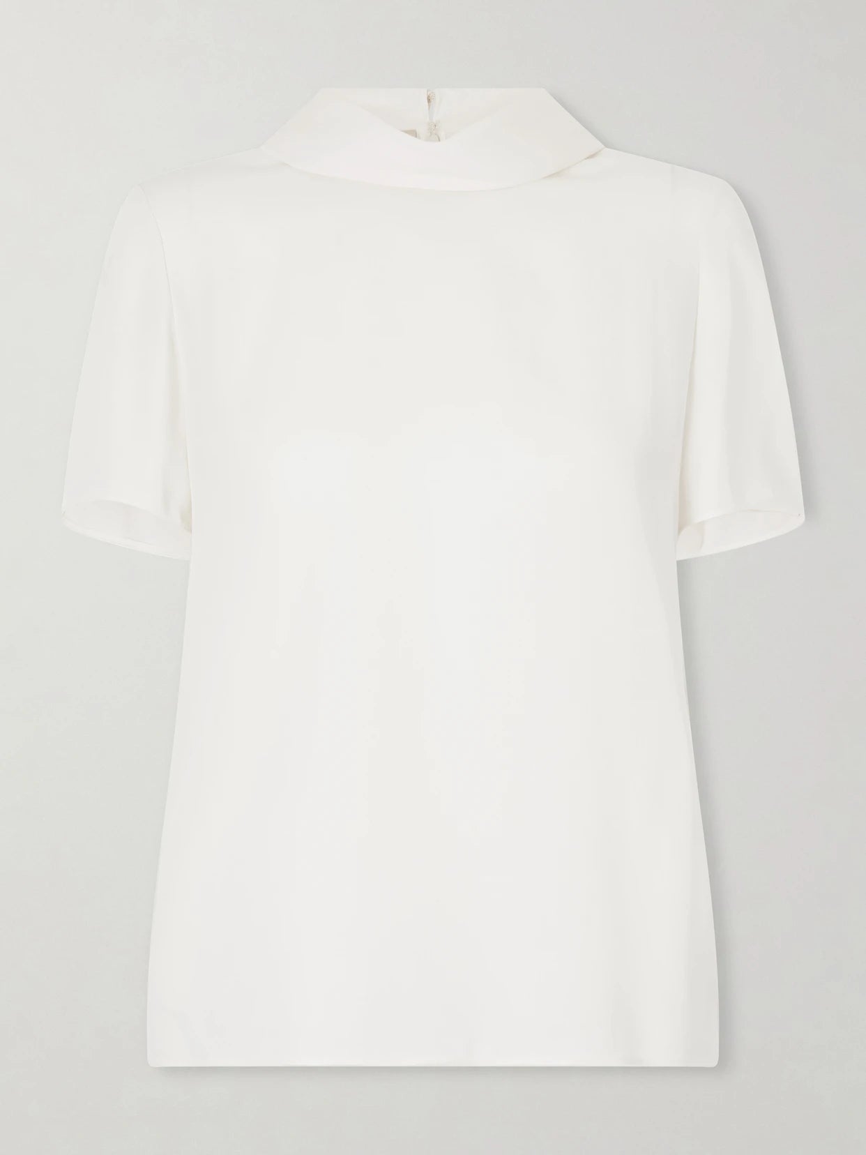 Image of a model wearing Tops. Product name - Silk-georgette Blouse in Cream colour by brand - Valentino Garavani