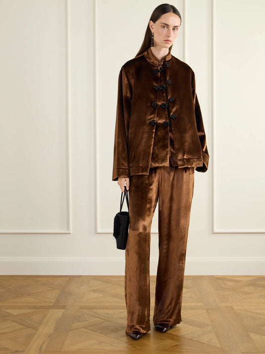 Image of a model wearing Pants. Product name - Jamee Velvet Wide-leg Pants in Brown colour by brand - RÓHE