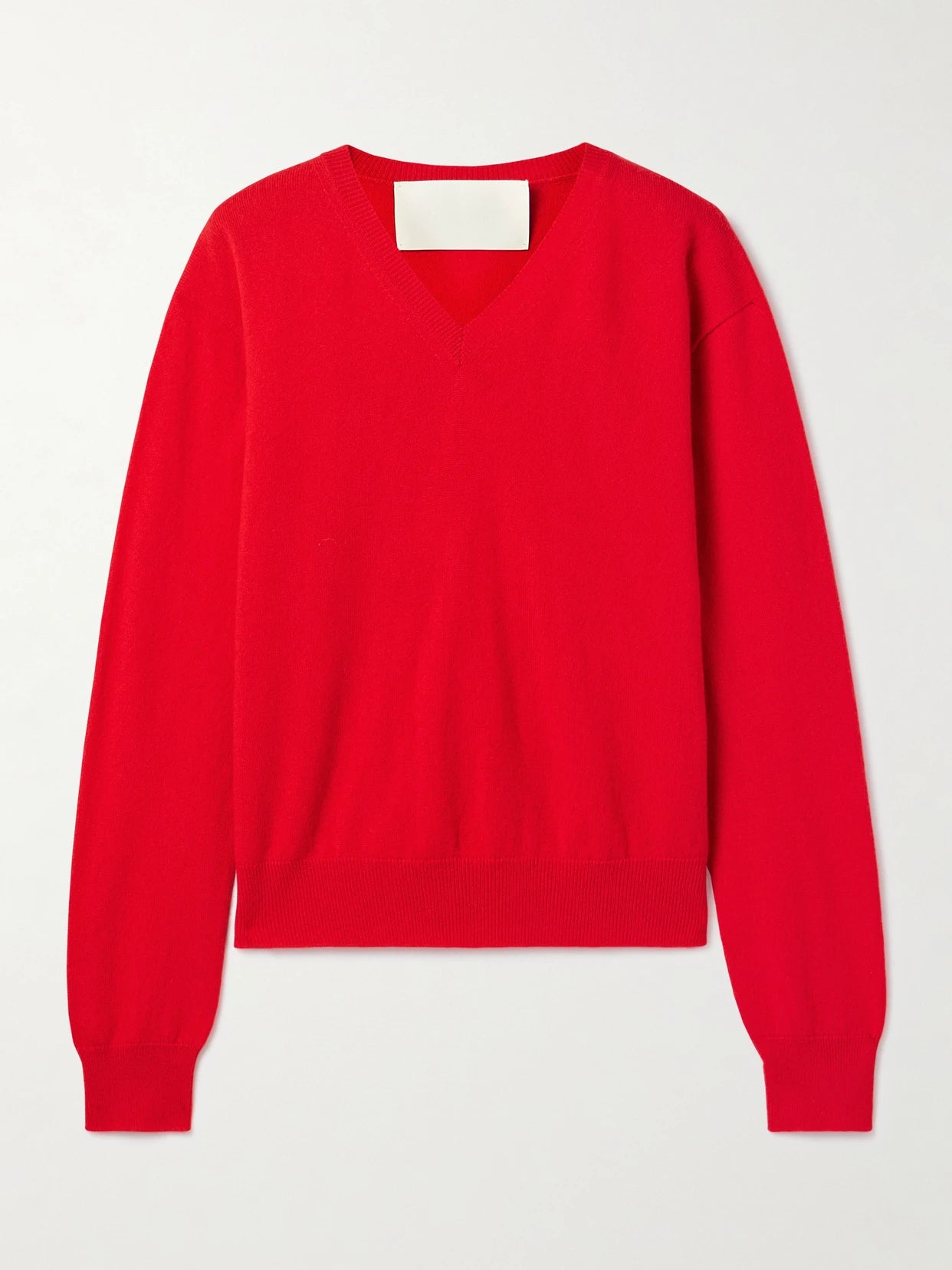 Image of a model wearing Outerwear. Product name - The Sanderson Cashmere Sweater in Red colour by brand - RÙADH