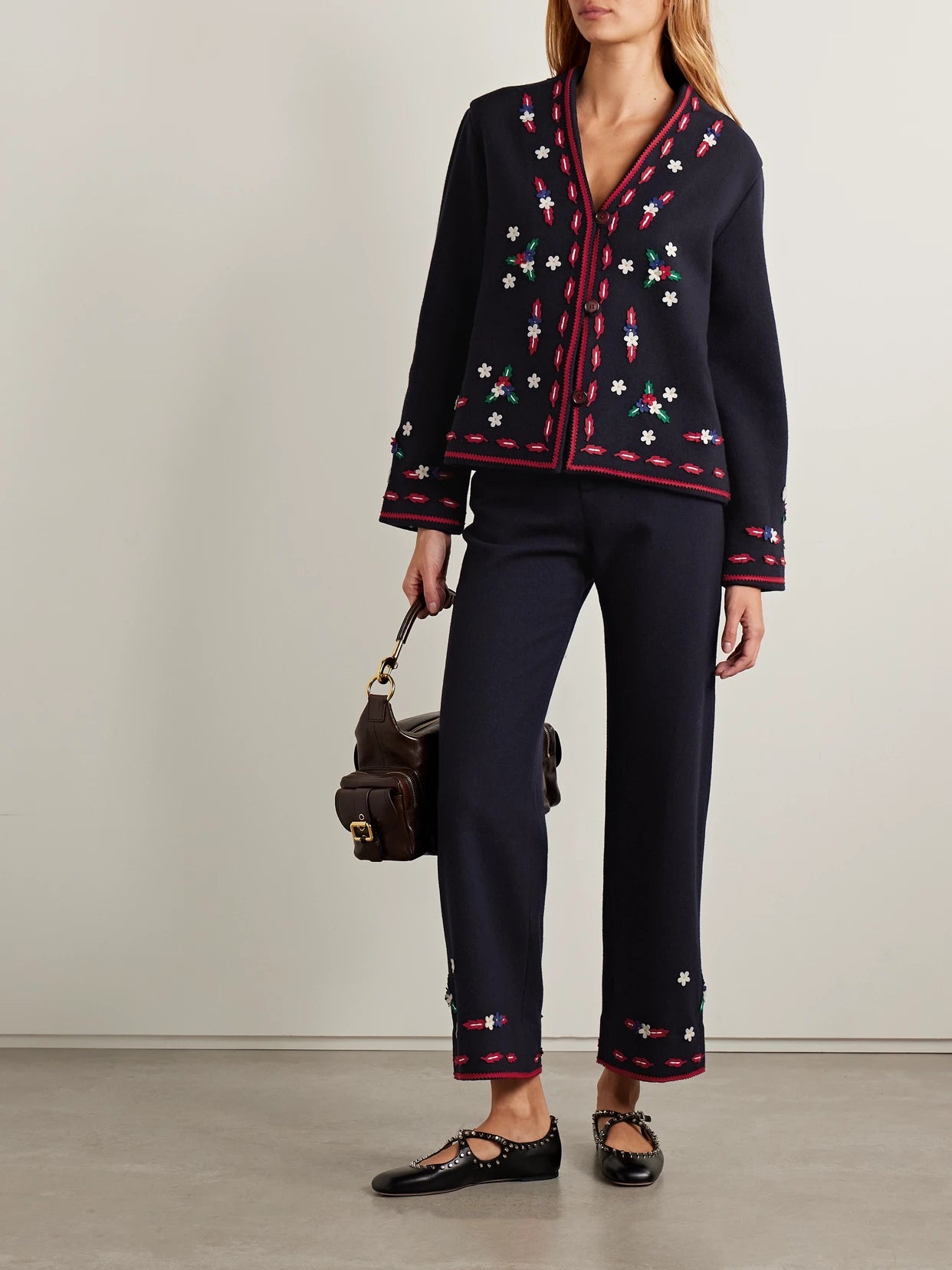 Image of a model wearing Pants. Product name - Carroll Appliquéd Wool Felt Straight-leg Pants in Navy colour by brand - BODE