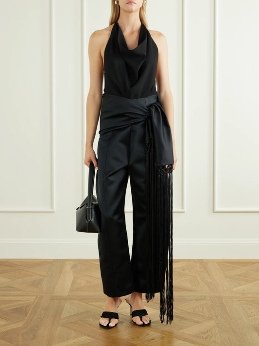 Image of a model wearing Tops. Product name - Assisi Draped Crepe Top in Black colour by brand - Ilkyaz Ozel