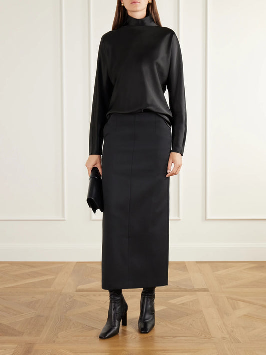 Image of a model wearing Tops. Product name - Maddy Satin Blouse in Black, Off-white colour by brand - Almada