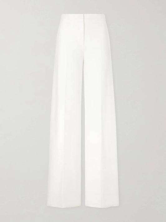 Image of a model wearing Pants. Product name - Cotton-piqué Wide-leg Pants in White colour by brand - Max Mara