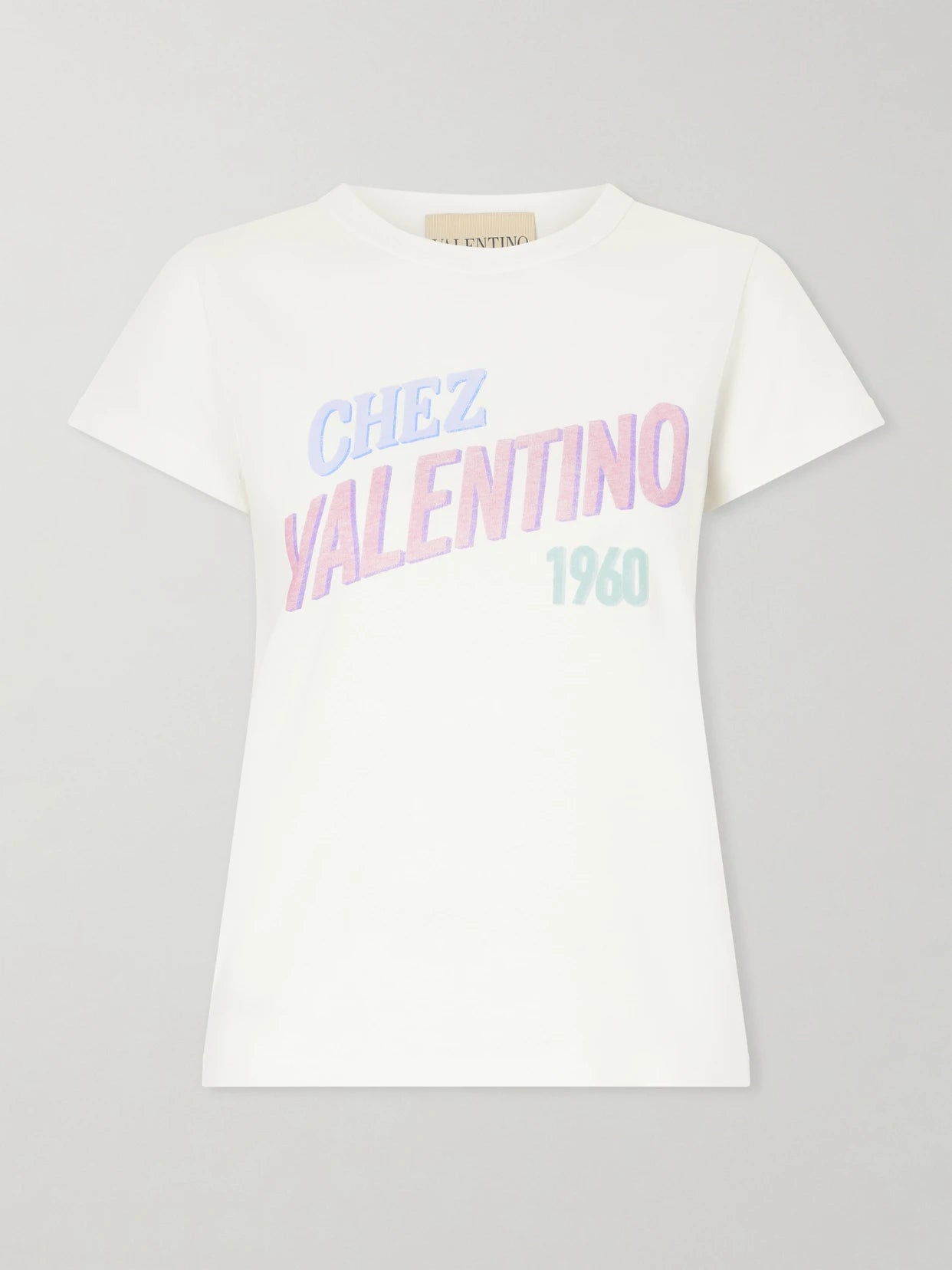 Image of a model wearing Tops. Product name - Printed Cotton Jersey T-shirt in White colour by brand - Valentino Garavani