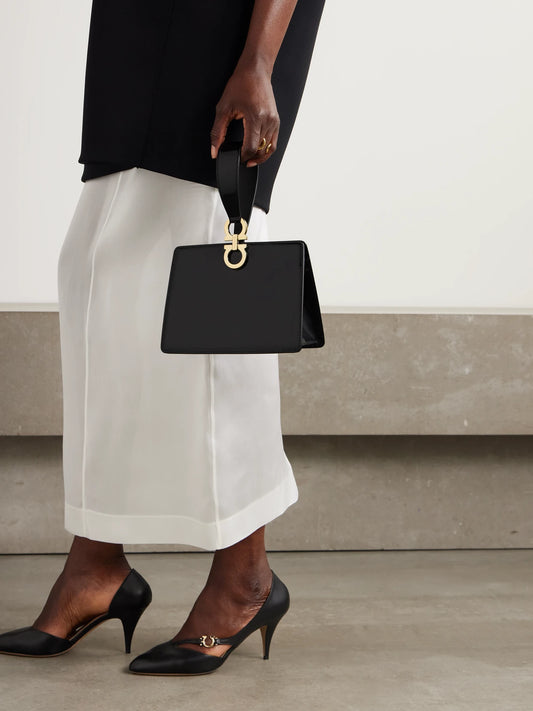 Image of Bags. Product name - Mini Embellished Glossed-leather Clutch in Black colour by brand - Ferragamo