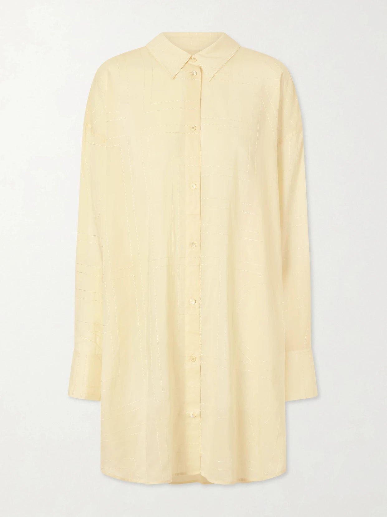 Image of a model wearing Tops. Product name - Lyocell And Cotton-blend Shirt in Pastel yellow colour by brand - TOTEME