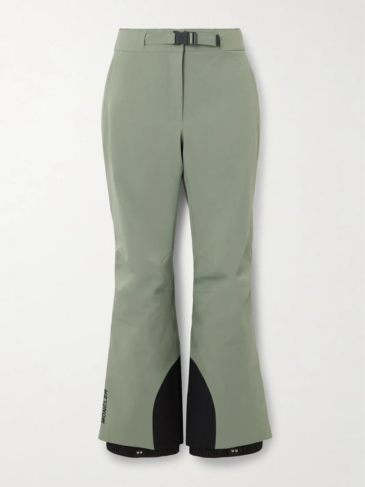 Image of a model wearing Pants. Product name - Belted Ski Pants in Sage green colour by brand - Moncler Grenoble