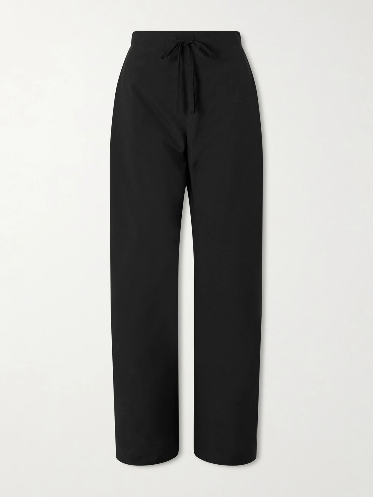 Image of a model wearing Pants. Product name - Rohen Wool Pants in Black colour by brand - KHAITE