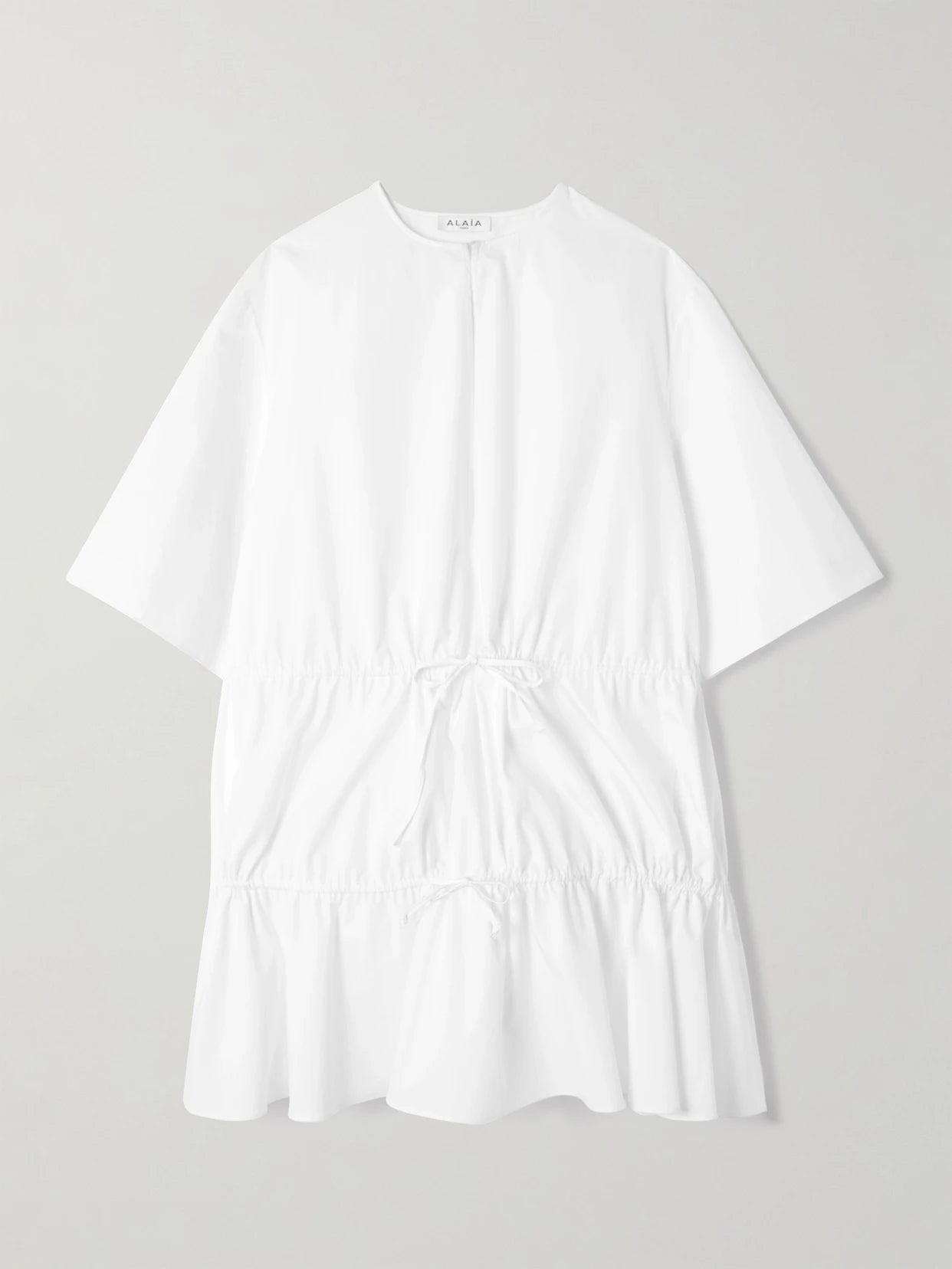 Image of Dresses. Product name - Gathered Cotton-poplin Mini Dress in White colour by brand - Alaïa