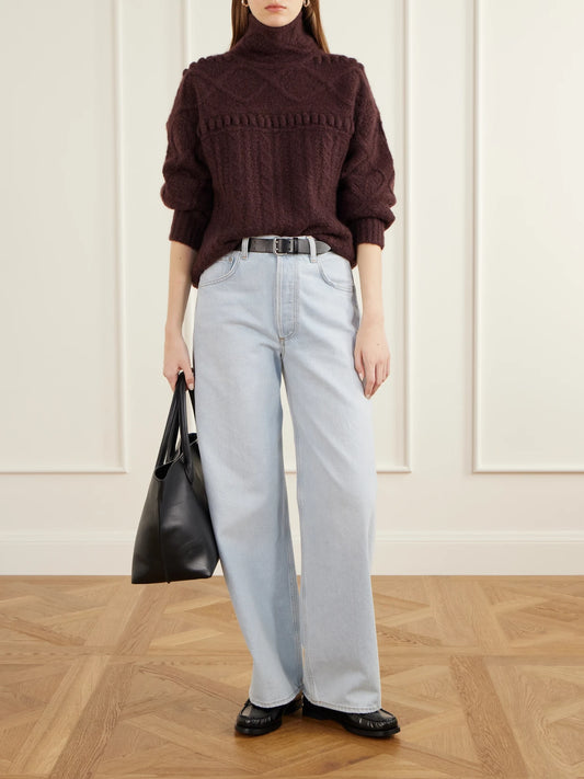 Image of a model wearing Outerwear. Product name - Super Cloud Cashmere And Silk-blend Knitted Turtleneck Sweater in Burgundy colour by brand - Guest In Residence
