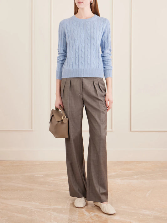 Image of a model wearing Outerwear. Product name - Silvie Cable-knit Cashmere Sweater in Light blue colour by brand - Nili Lotan