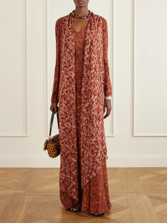 Image of a model wearing Tops. Product name - Meena Printed Silk-crepon Jacket in Orange colour by brand - Cortana