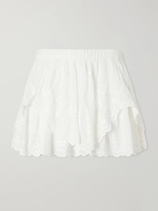 Image of a model wearing Shorts. Product name - Layle Broderie Anglaise Cotton Shorts in White colour by brand - MARANT ÉTOILE