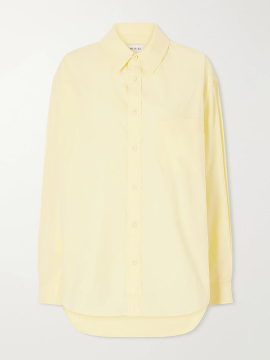Image of a model wearing Tops. Product name - Organic Cotton-poplin Shirt in Yellow colour by brand - Matteau