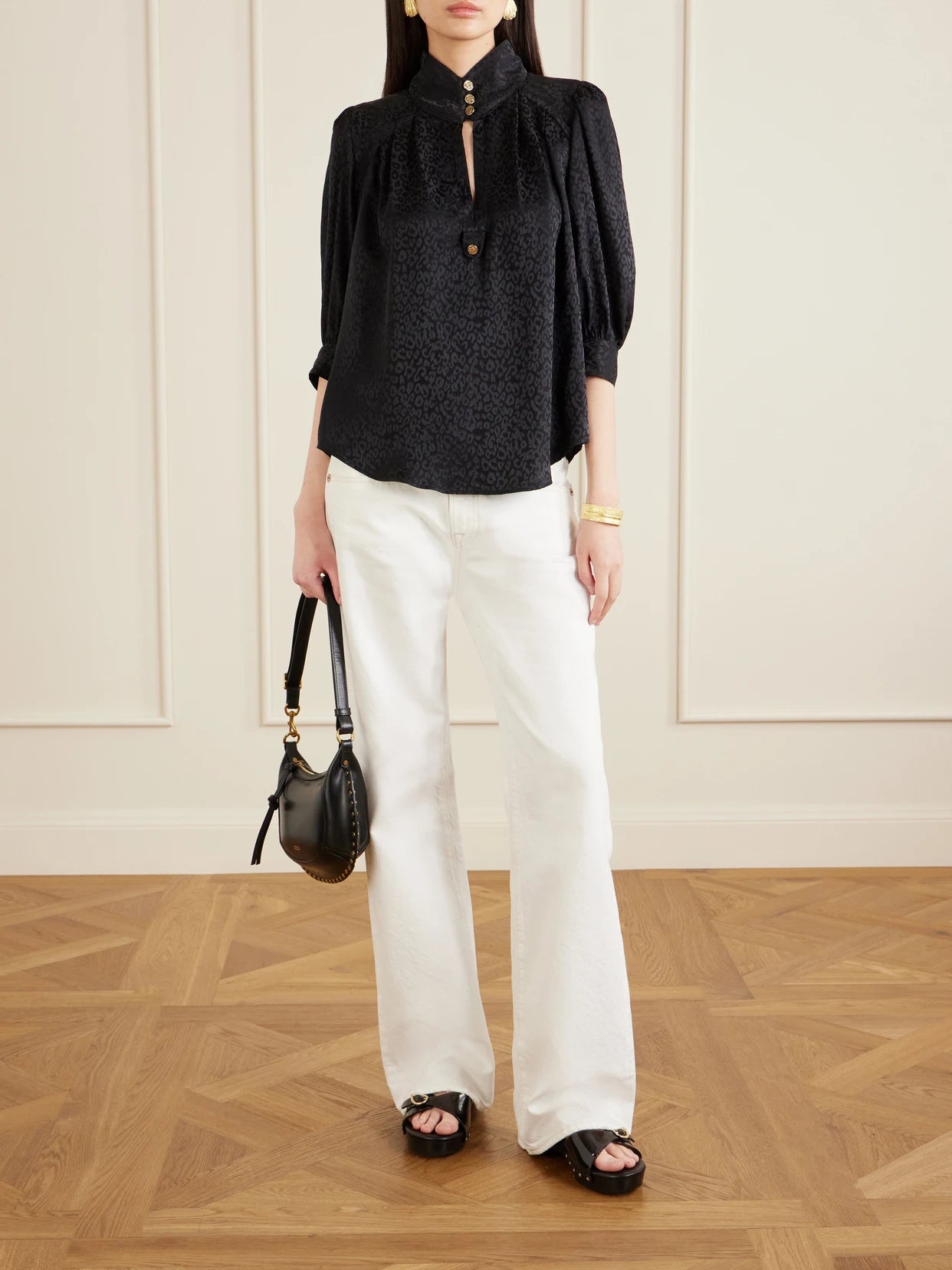 Image of a model wearing Tops. Product name - Papisoleil Silk-satin Jacquard Blouse in Black colour by brand - MAISON MAYLE