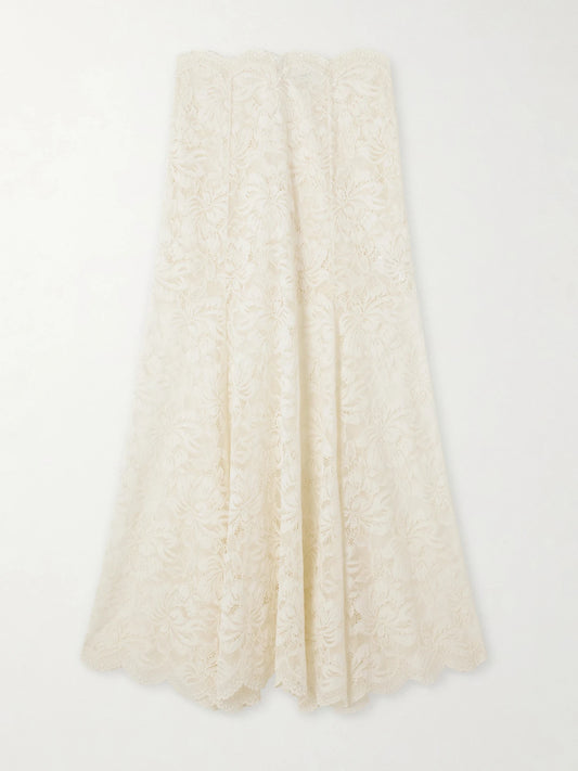 Image of a model wearing Skirts. Product name - Scalloped Lace Maxi Skirt in Ivory colour by brand - RABANNE