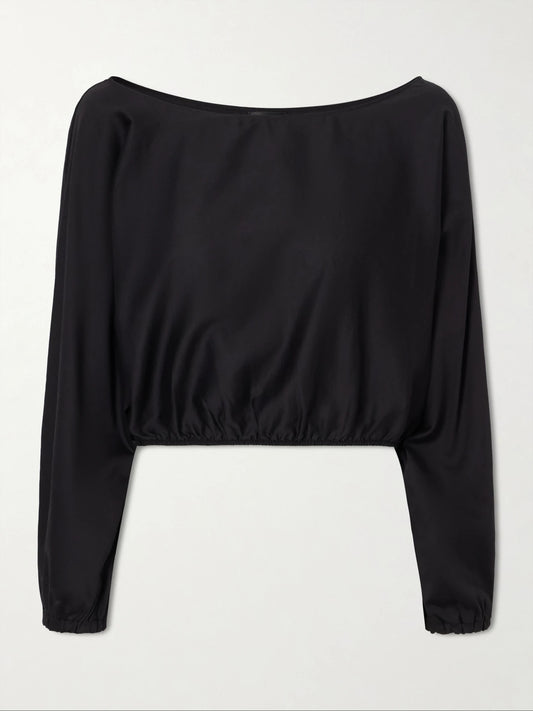 Image of a model wearing Tops. Product name - Yoko Cropped Gathered Cotton-poplin Top in Black colour by brand - LESET