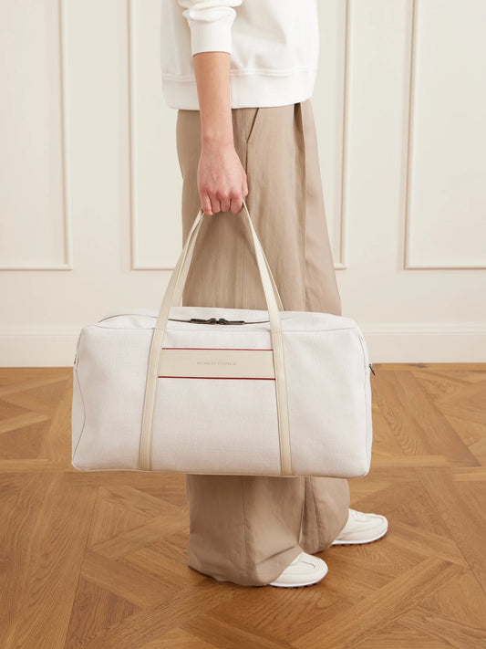 Image of Shoes. Product name - Leather-trimmed Canvas Tennis Bag in Ecru colour by brand - Brunello Cucinelli